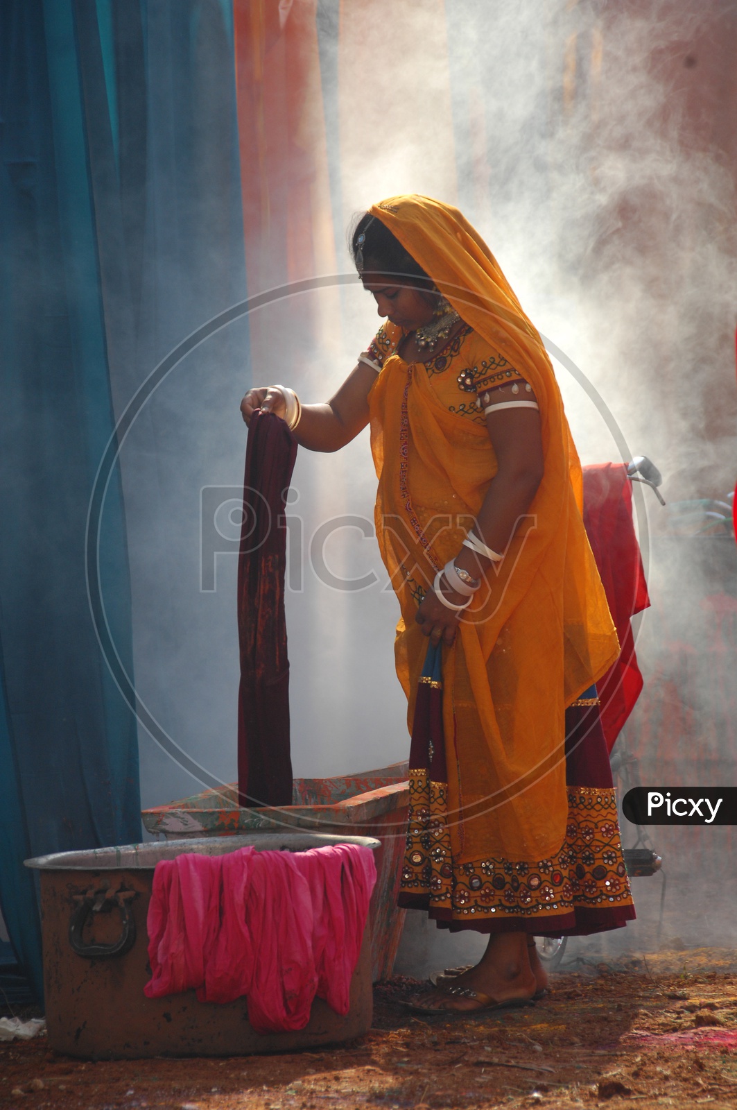 Rajasthani woman washing clothes