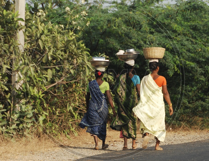 Women returning home after work