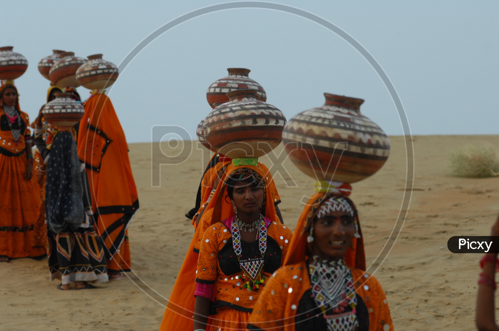 Rajasthani women carrying pots on their heads