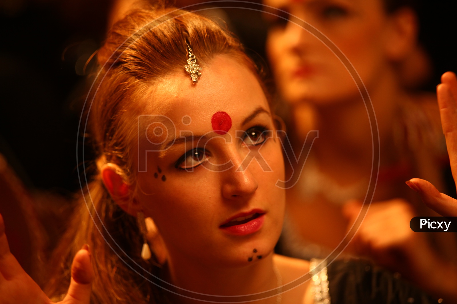 A Foreign Female Dancer in an Indian Woman Makeup In a Movie Shooting