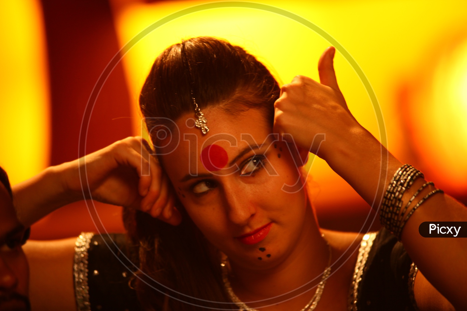 A Foreign Female Dancer in an Indian Woman Makeup In a Movie Shooting