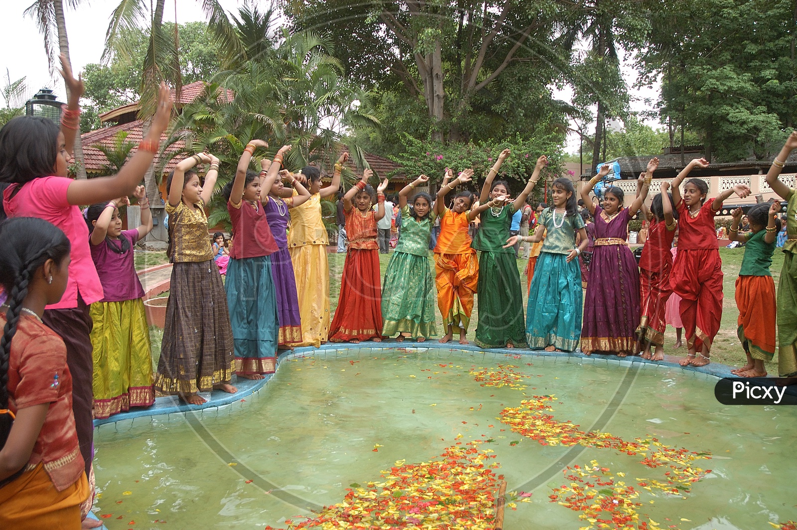 Indian Girl Children In Traditional Dresses Performing a Group Dance