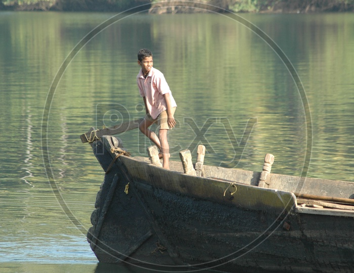 Indian Boy in a Boat