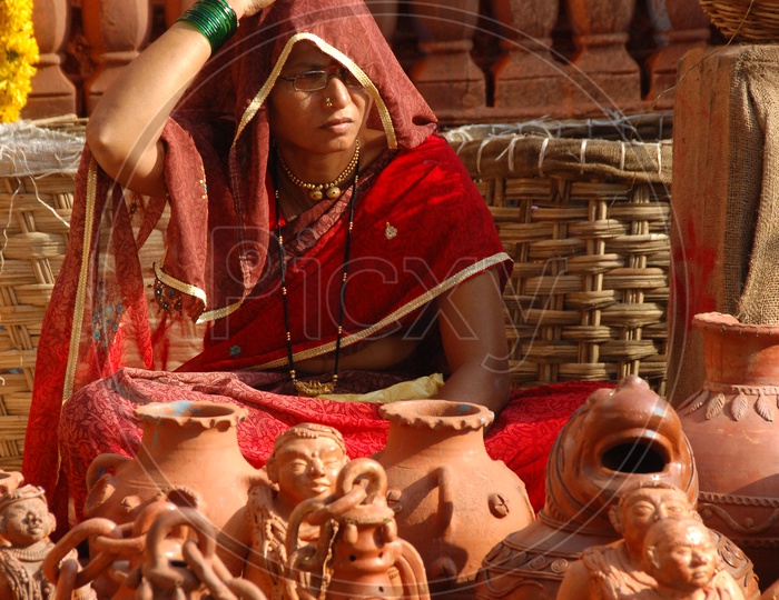 Woman selling clay pots