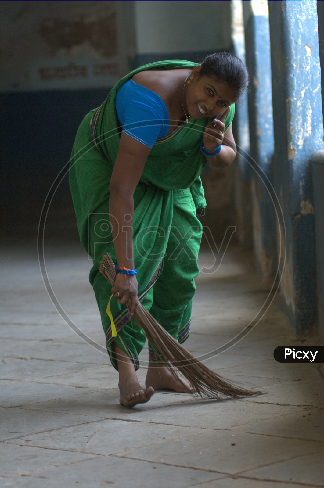 Female worker using cell phone