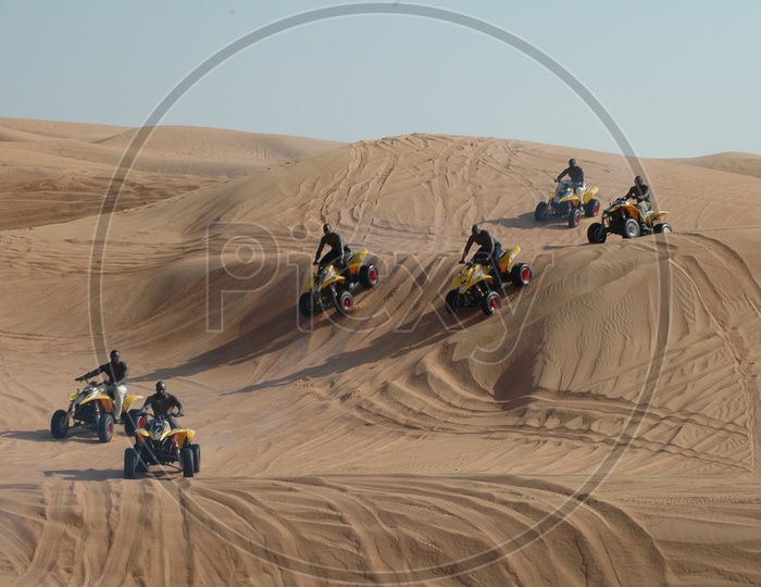 Quad Bike Riding In The Desert sand Dunes
