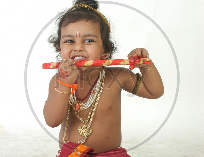 Image Of A Cute Indian Boy In A Hindu God Sri Krishna Getup KH074774 Picxy