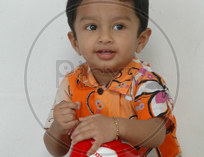 Indian Kid in a studio