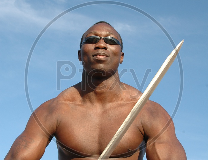 Movie Stills Of an Indian Telugu Movie With Swords In hand Of a African Fighters