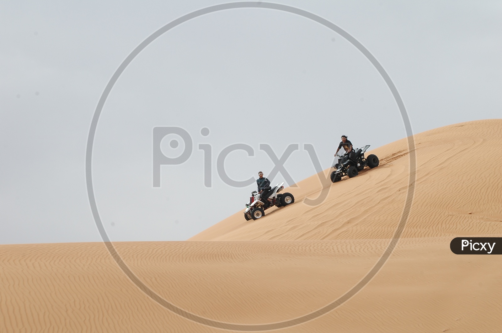 Quad Bike Riding In The Desert sands