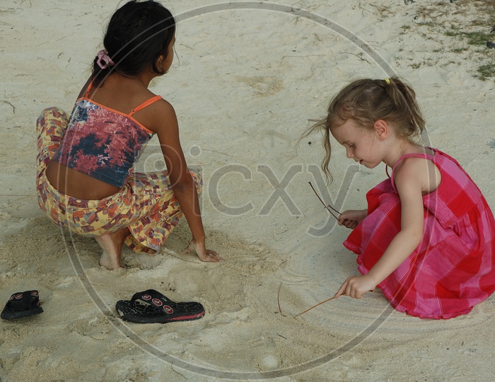 Sisters playing in a Beach