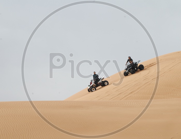 Quad Bike Riding In The Desert sands