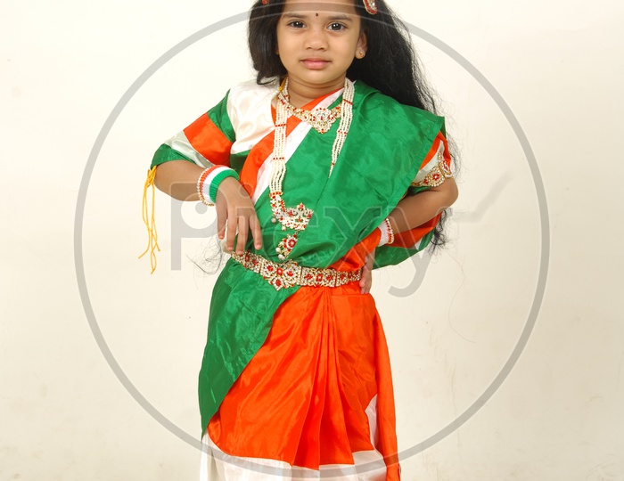 Indian Girl Child in Bharath Maatha Getup  over an Isolated White Background