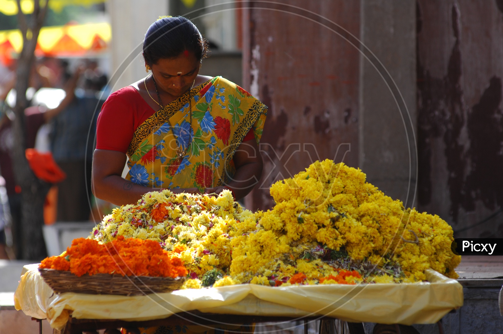 woman flower vendor