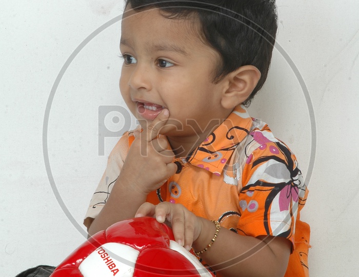 Indian Kid in a studio