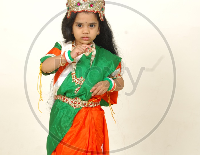 Indian Girl Child in Bharath Maatha Getup  over an Isolated White Background