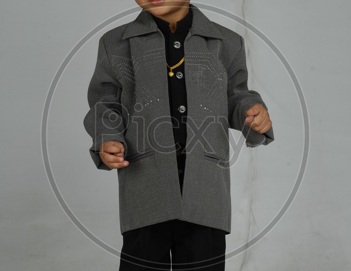 Indian Boy Child  Closeup Shot With a Smiling Face Over an Isolated White Background