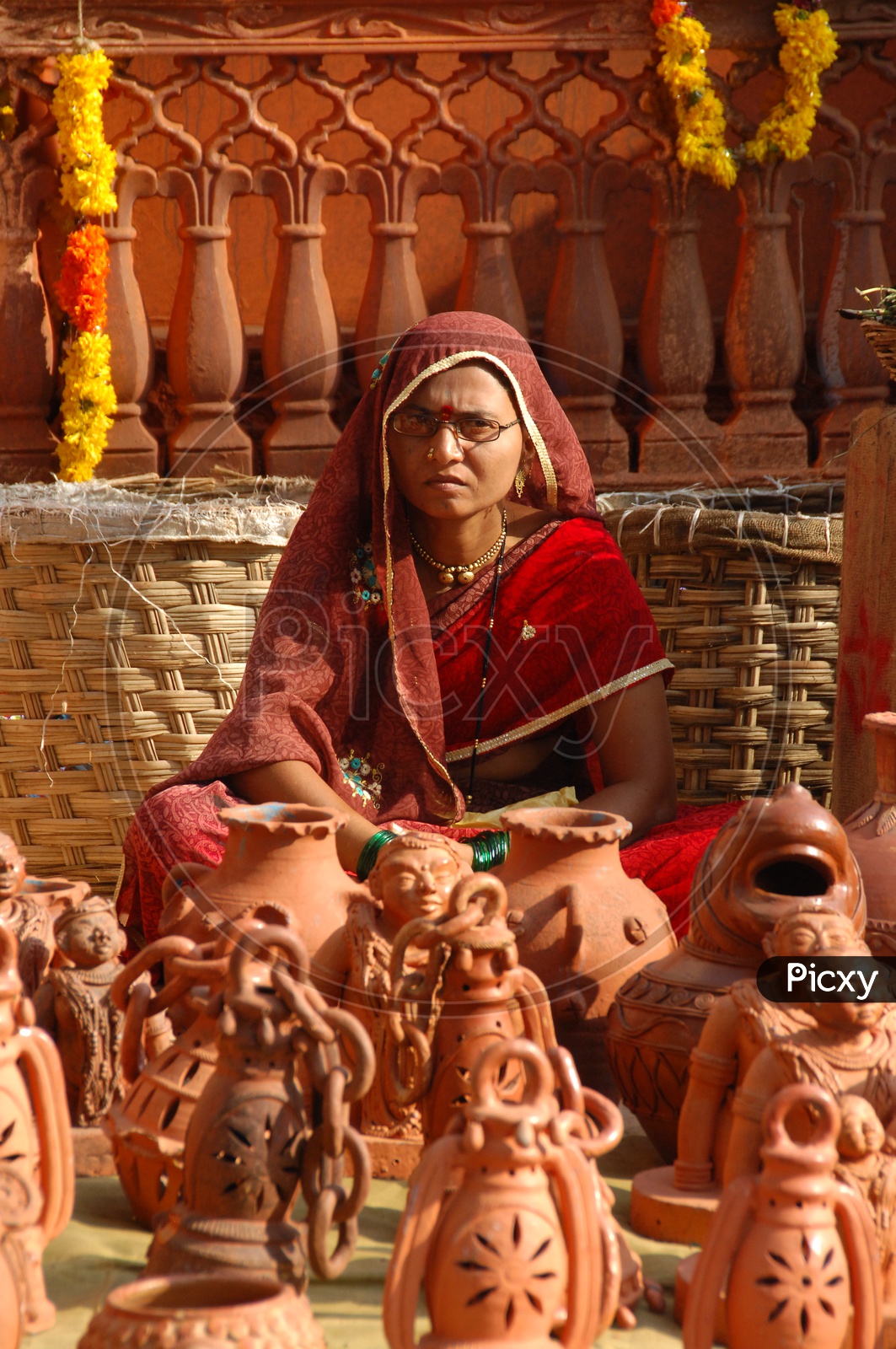 Woman selling clay pots