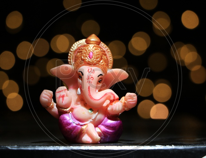 Lord Ganesh/Vigneshwara/Vinayaka Idol with Bokeh Background