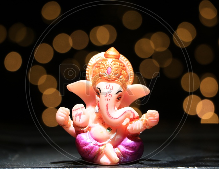 Lord Ganesh/Vigneshwara/Vinayaka Idol with Bokeh Background
