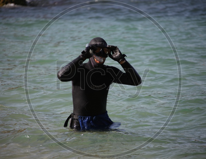 A Deep Water Sea Diving Instructor In a Suite