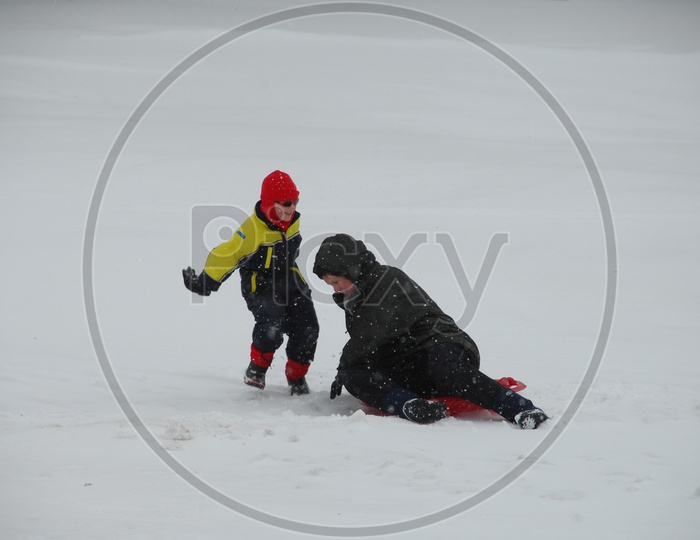 A Father And his Child in Snow