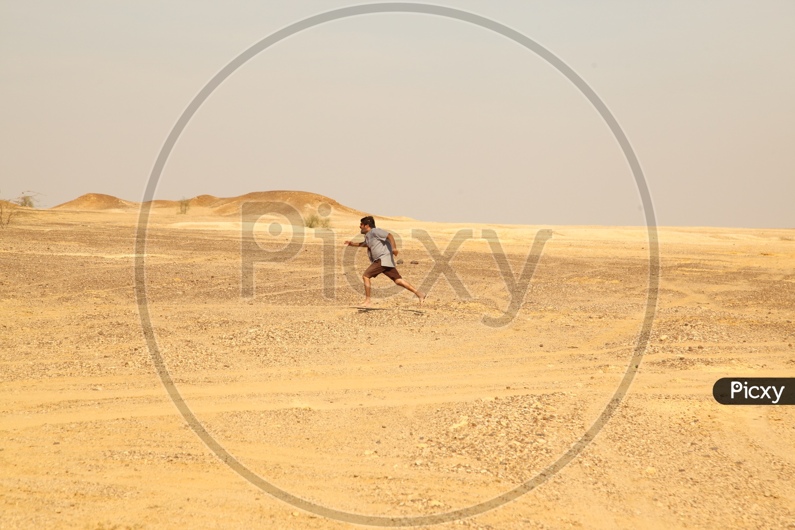 A Man running In Desert With an Emotion