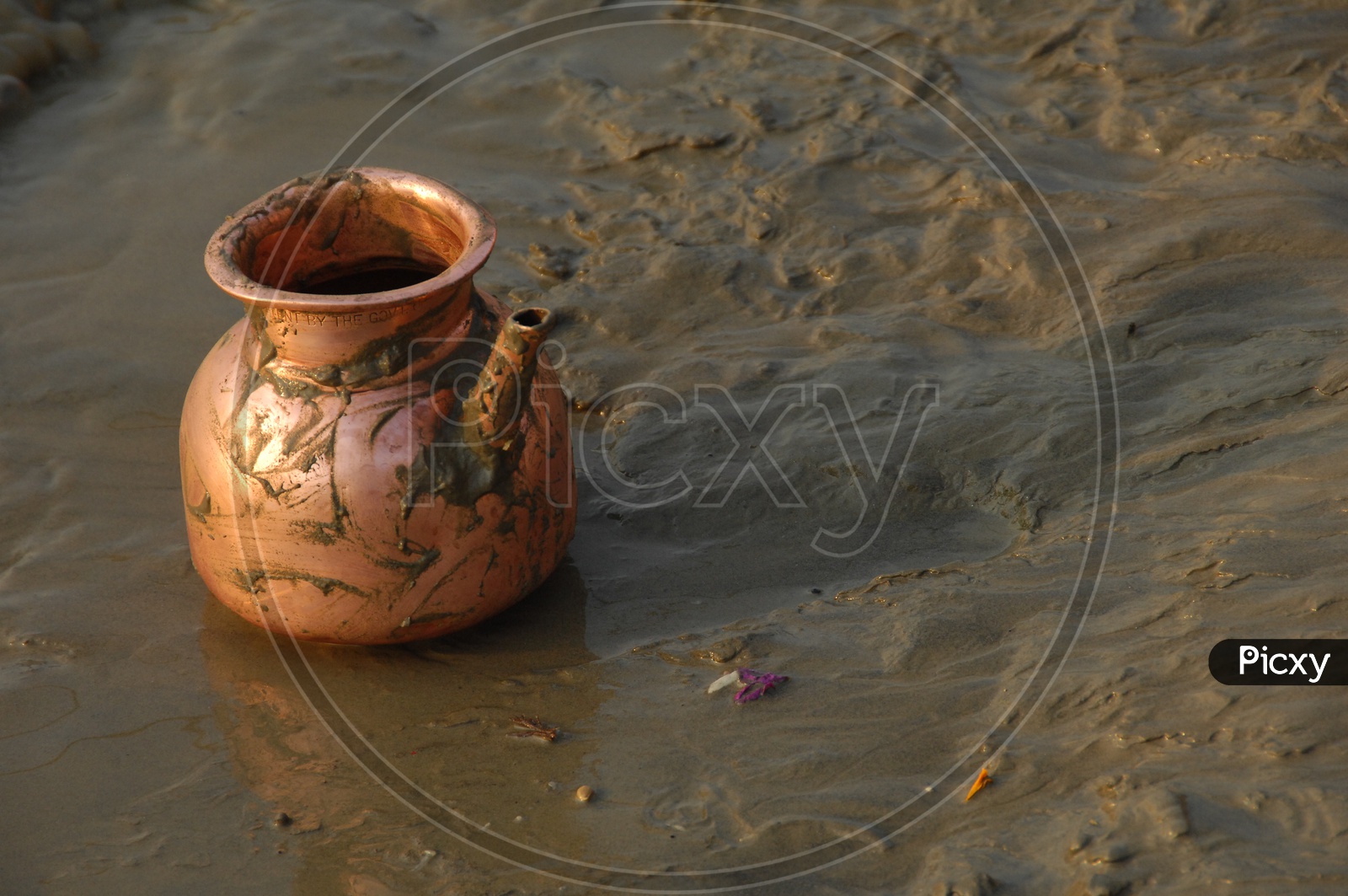 Brass Tea Vessel in Mud