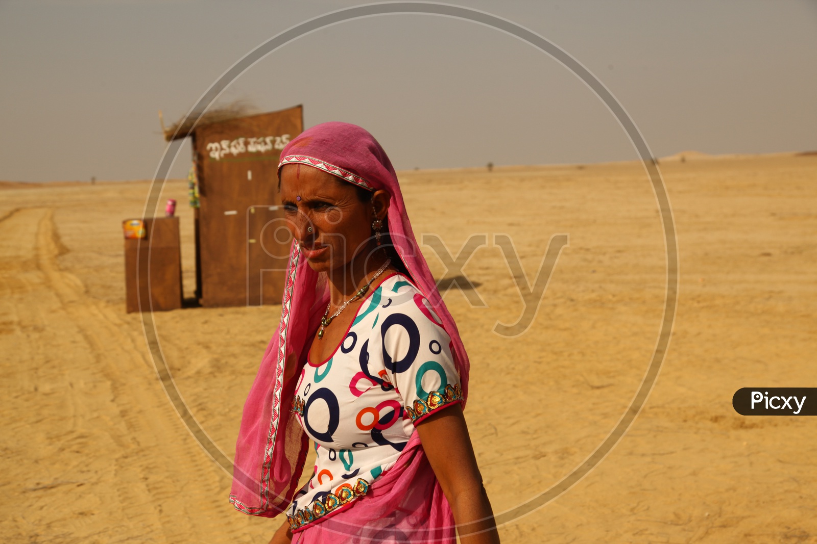 An Traditional rajasthani Woman In Desert