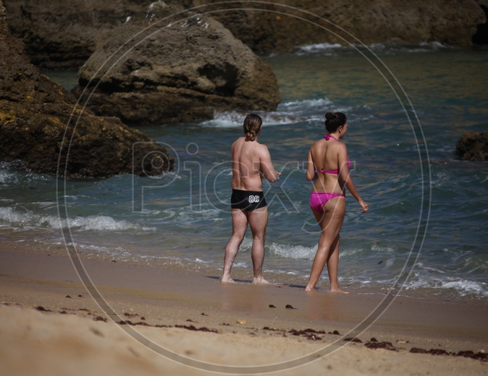 Women In Swim Suits at a Beach