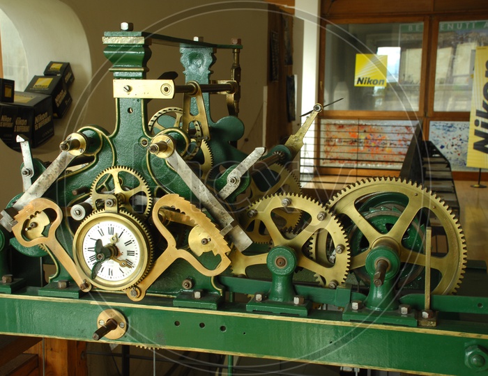 An Old machine With Gear wheels and Measure Indicator