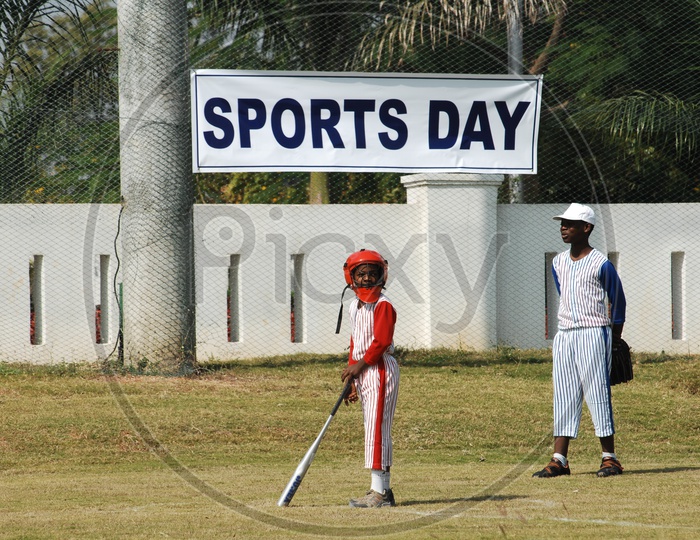 Children at the School Sport day - Playing Baseball
