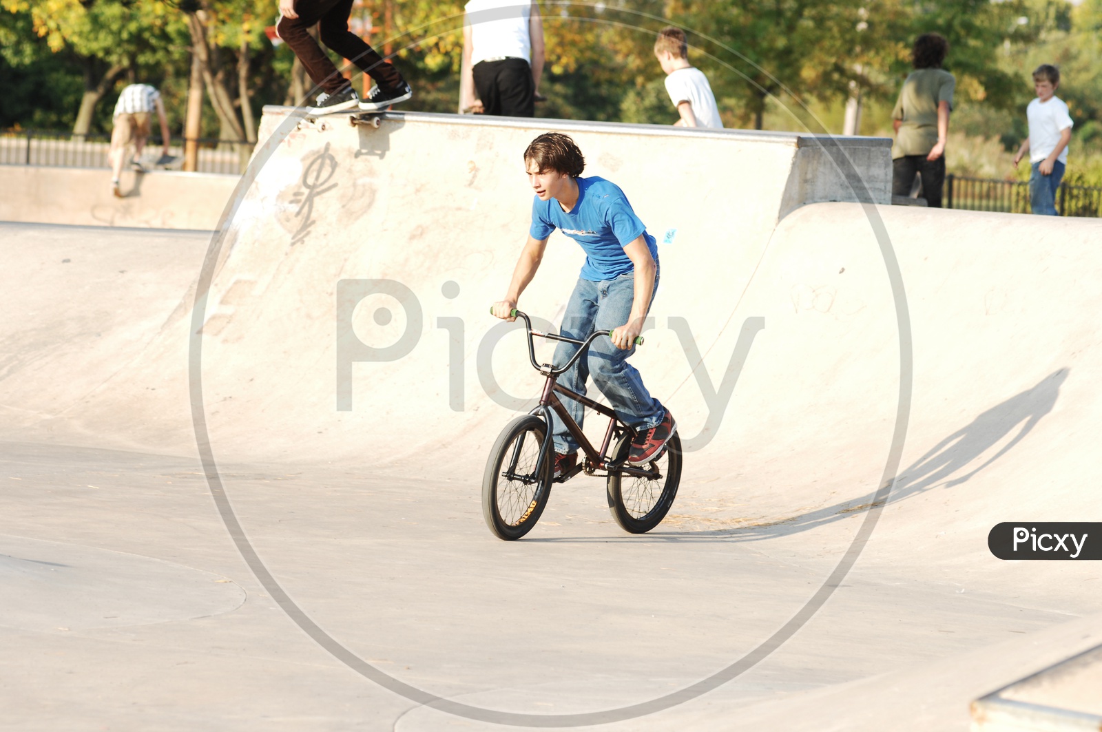 Children Riding Bicycle and doing Stunts