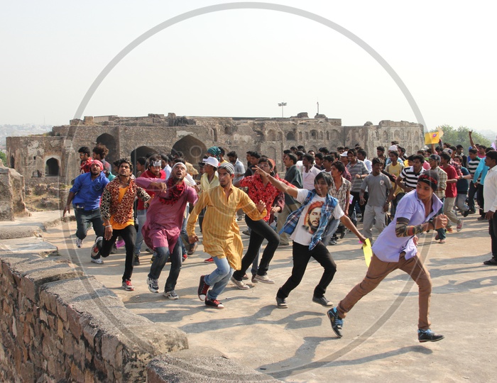People Running On the roof top of Golconda