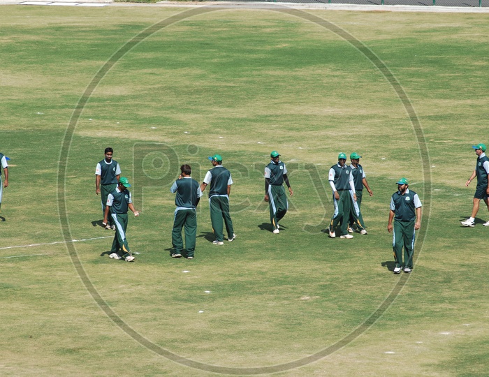 Cricketers in a Practice Session