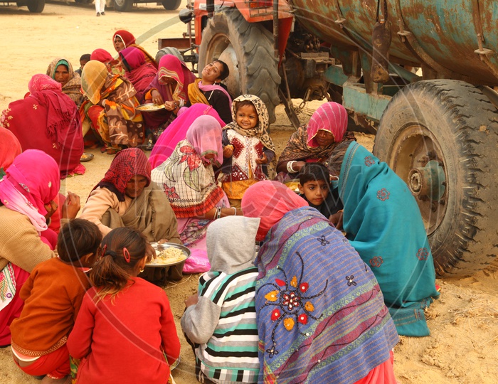 Rajasthan Local Women Having Food sitting as a Group