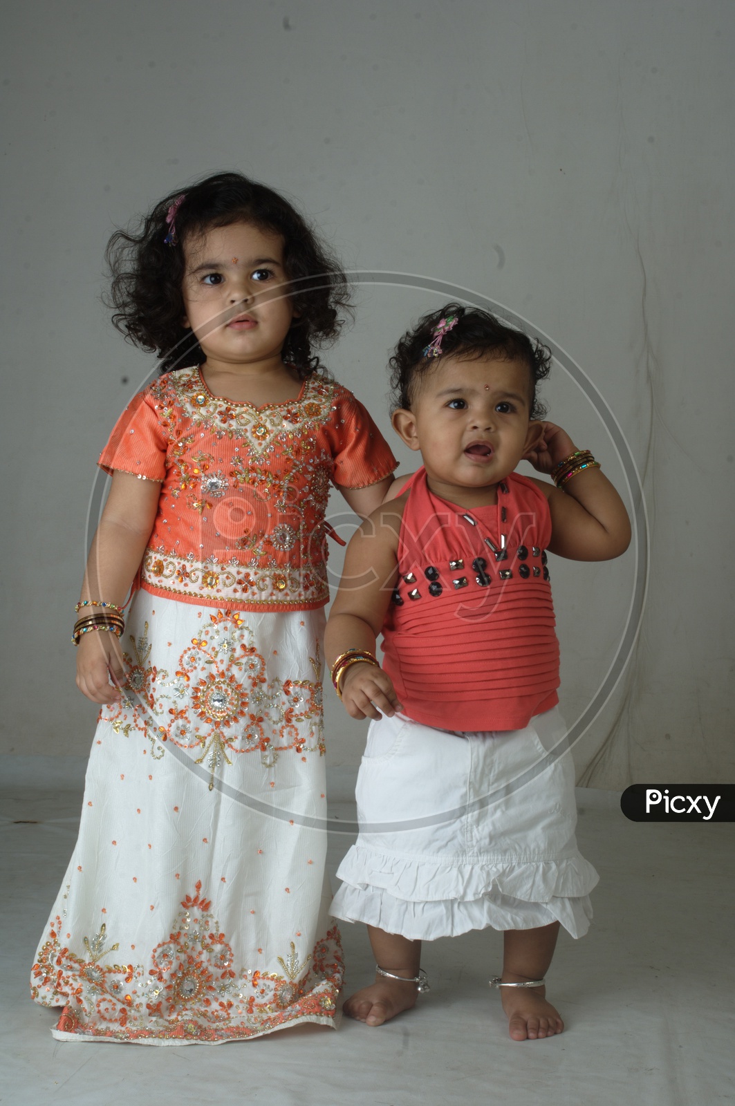 Indian Girl kid in a studio with her sister