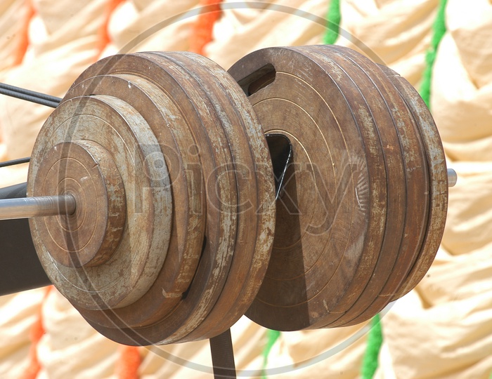 Iron Weights on a Trolly