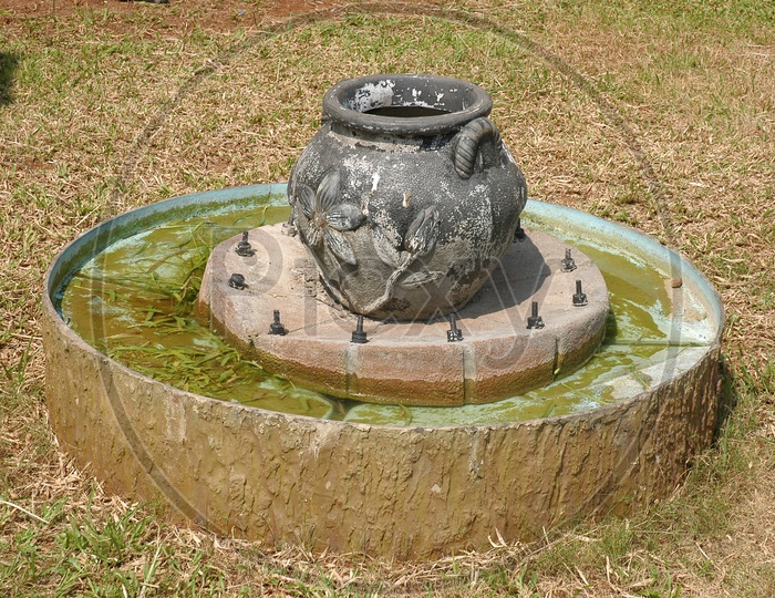A Pot Shaped  Water Fountains In Garden