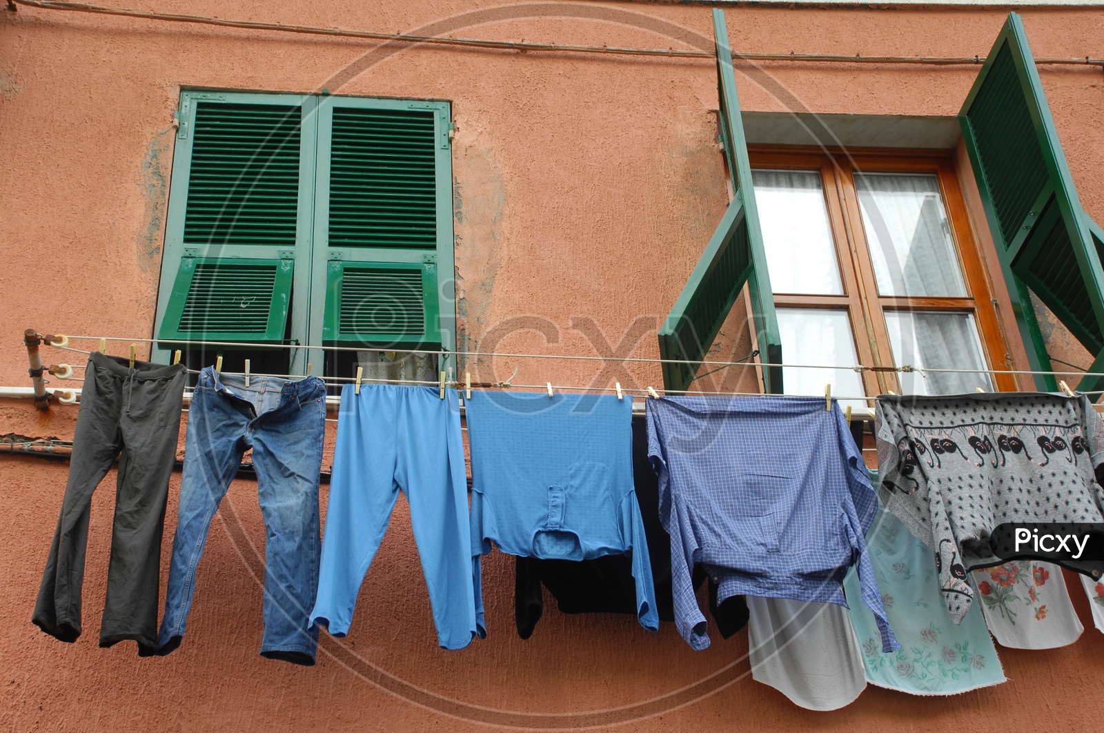 Clothes Drying By Hanging to a Thread in India