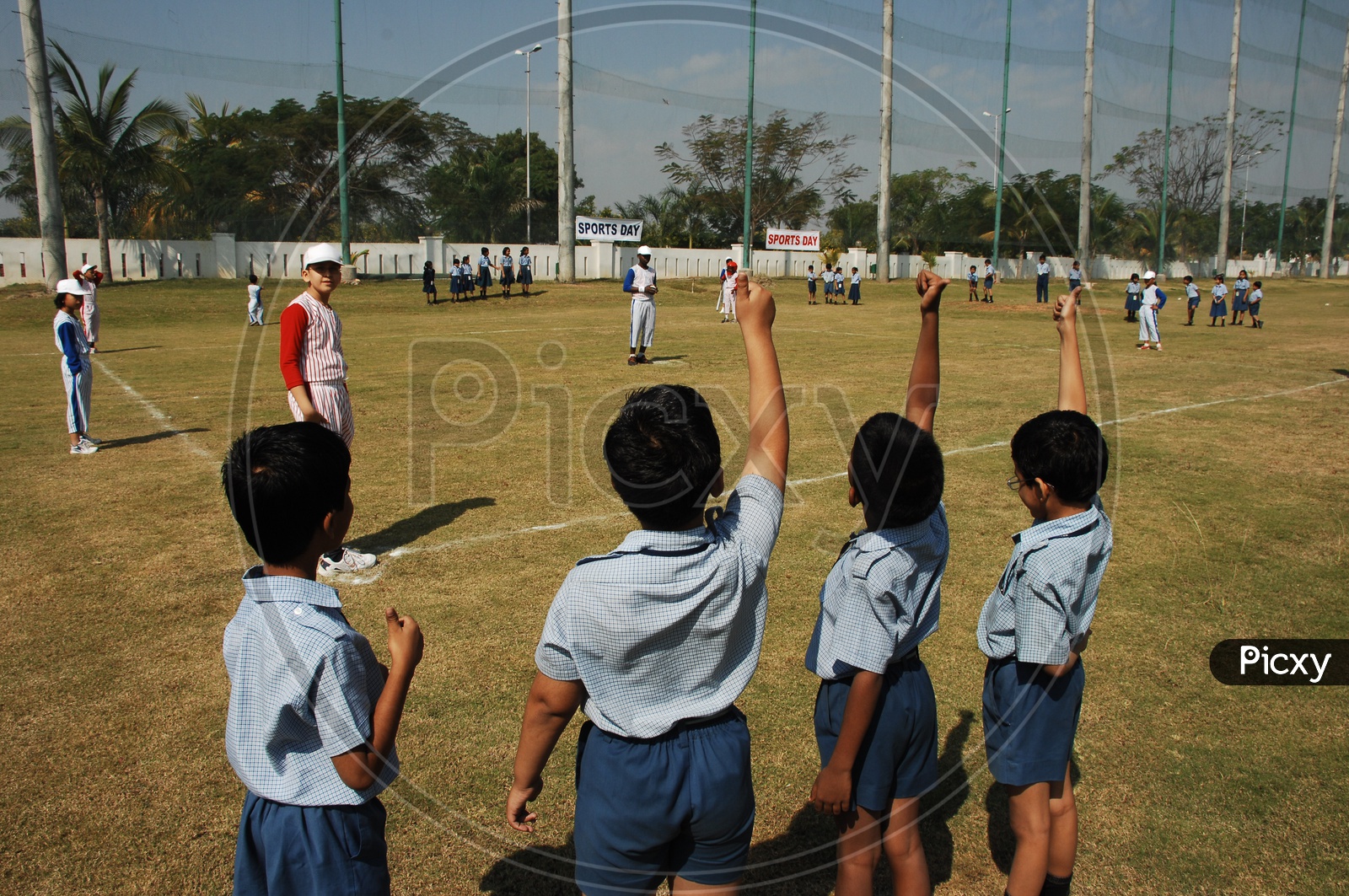 Children cheering other kids at the School Sport day