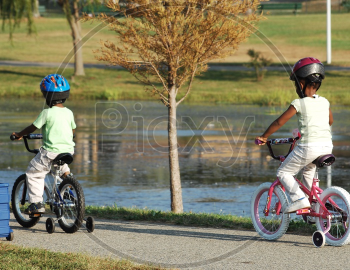 Children Riding Bicycle