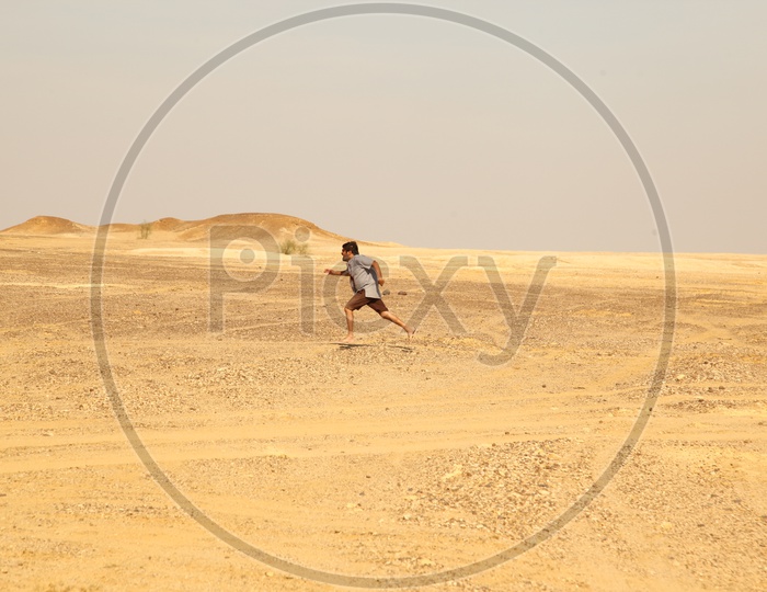 A Man running In Desert With an Emotion