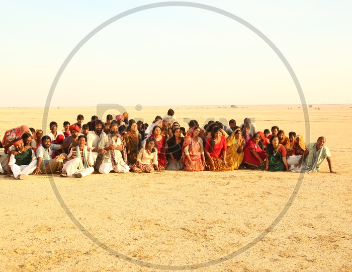 Village People Standing in an Order in Desert