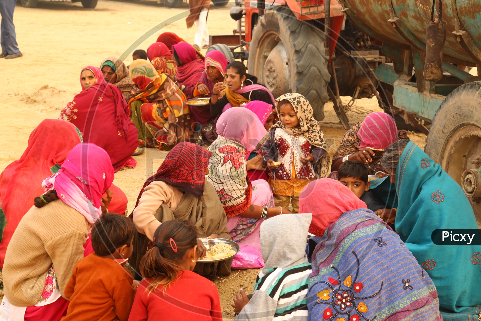 Rajasthan Local Women Having Food sitting as a Group