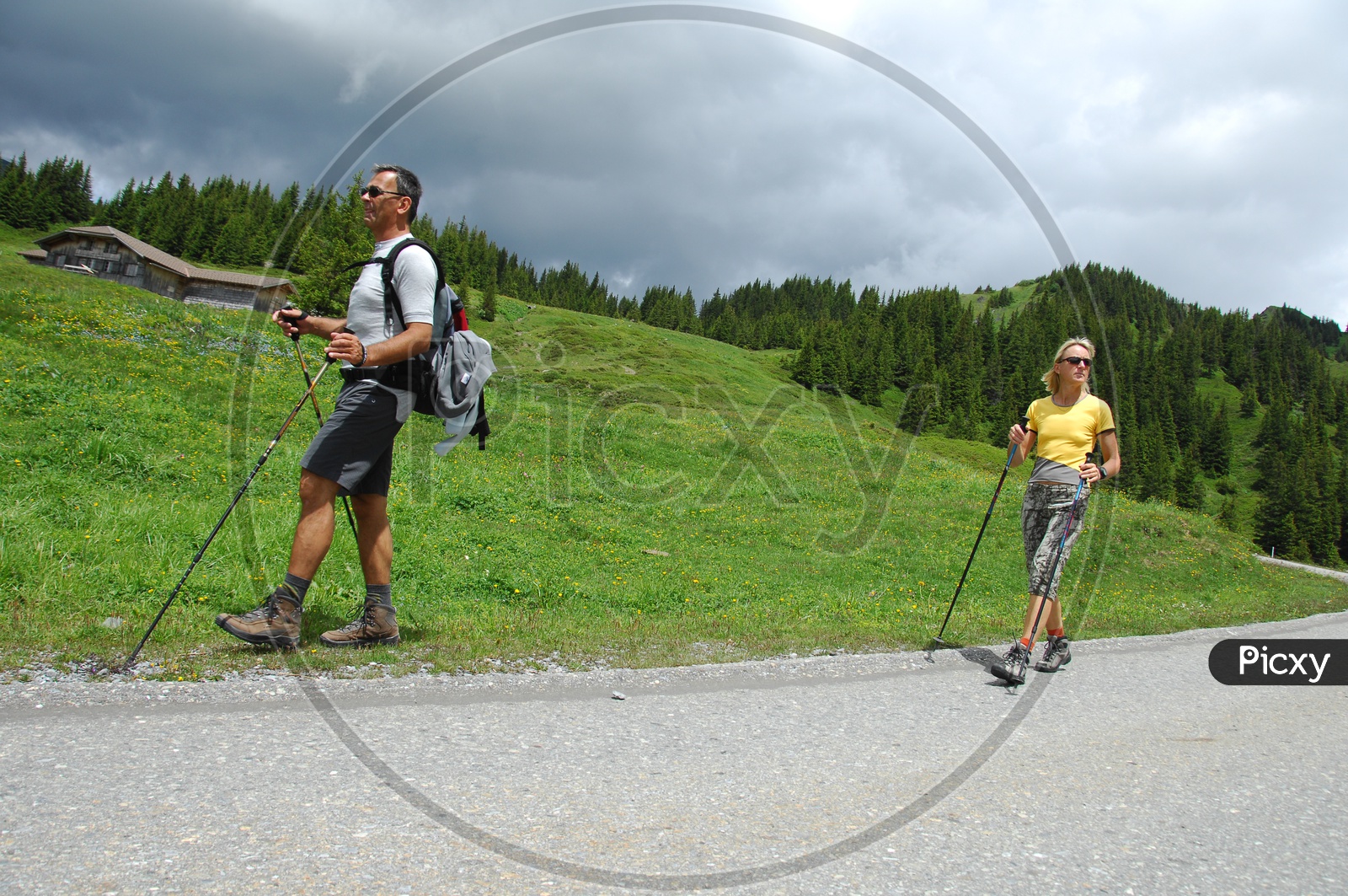 Trekkers With Hiking Poles / Trekking Poles on pathways of Hill station