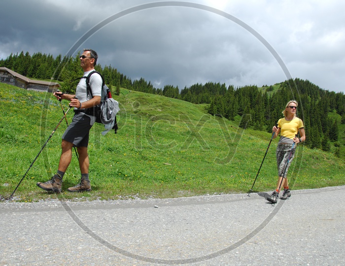 Trekkers With Hiking Poles / Trekking Poles on pathways of Hill station