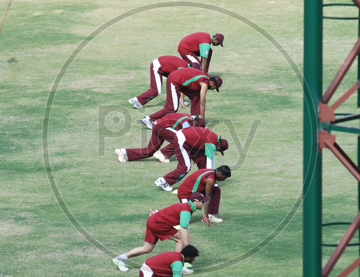 Cricketers in their Practice sessions working out in a ground