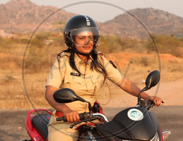 Female Police Officer of maharastra Police Riding a Bike