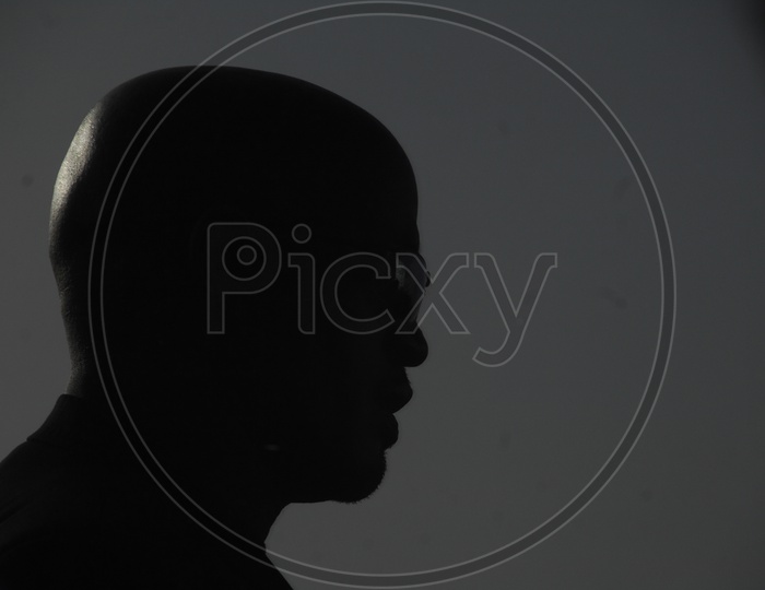 Silhouette Of a Bald Man